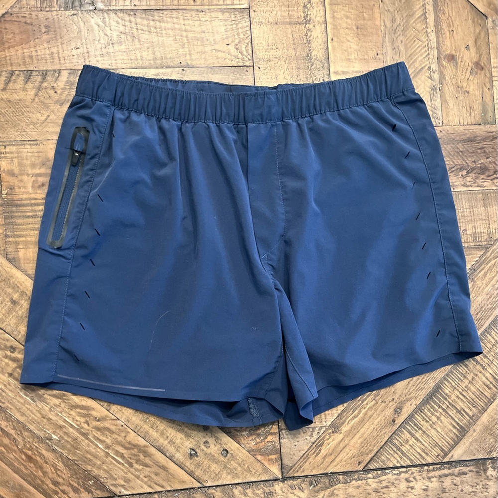 Blue Ten Thousand shorts size medium.  5” inseam and liner built in